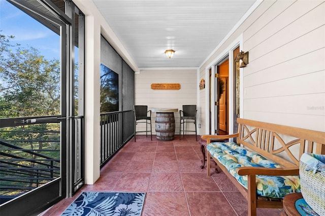 sunroom / solarium featuring plenty of natural light