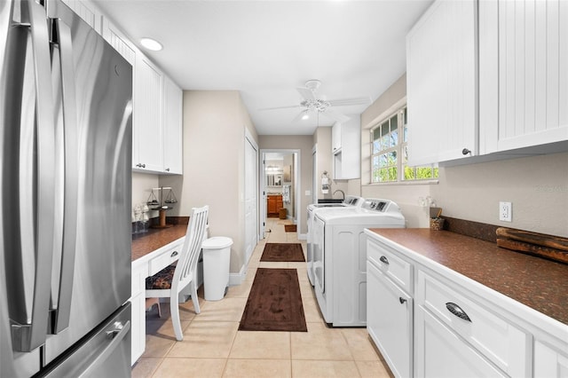 washroom featuring independent washer and dryer, ceiling fan, and light tile patterned flooring