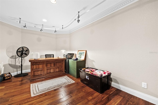 miscellaneous room with dark hardwood / wood-style flooring, crown molding, and rail lighting