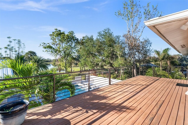 wooden deck with a water view