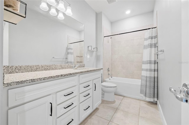 full bathroom featuring tile patterned flooring, shower / tub combo, vanity, and toilet