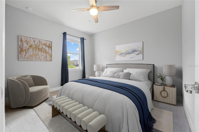 bedroom with ceiling fan and carpet