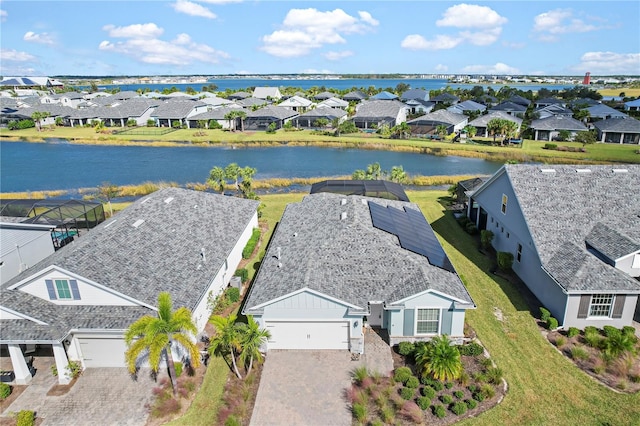 drone / aerial view with a water view