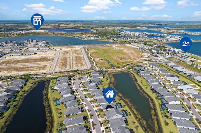 drone / aerial view featuring a water view