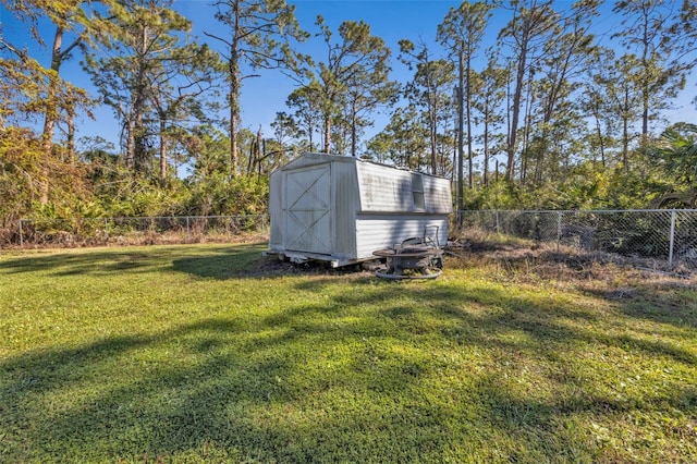 view of yard with a storage shed