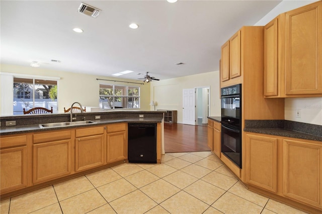 kitchen with ceiling fan, sink, light tile patterned floors, and black appliances