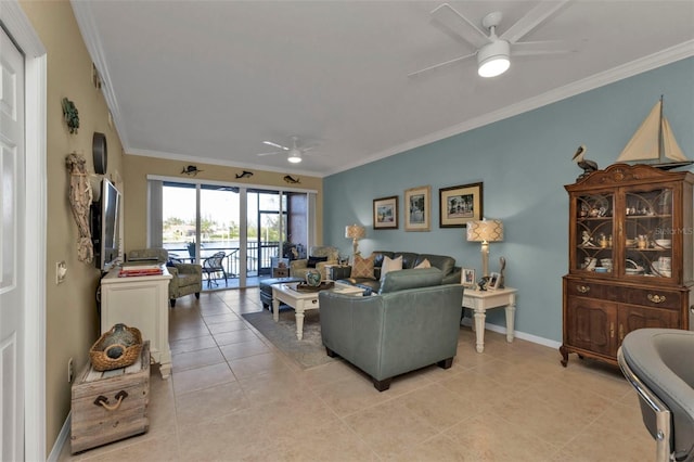 living room featuring crown molding, ceiling fan, and light tile patterned floors