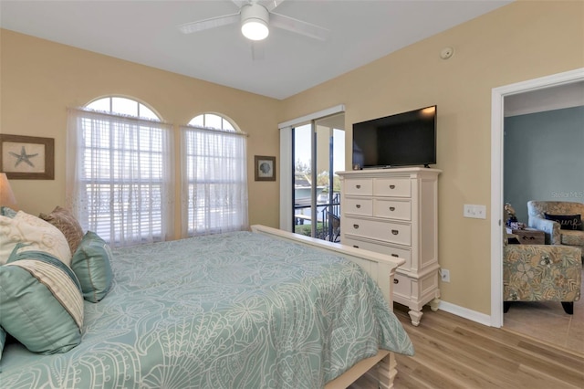 bedroom with light wood-type flooring and ceiling fan