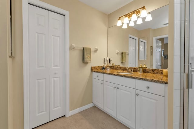 bathroom featuring tile patterned floors and vanity