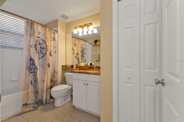 full bathroom with tile patterned flooring, shower / tub combo, vanity, and toilet