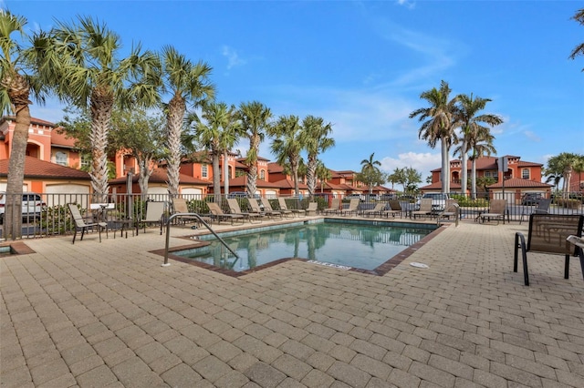 view of pool featuring a patio