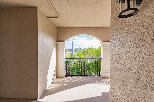 view of patio / terrace with a balcony