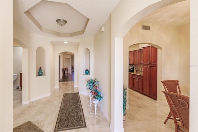 corridor with a raised ceiling