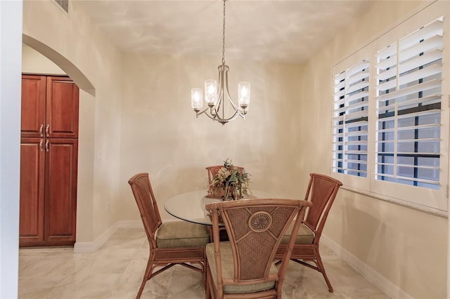 dining room with an inviting chandelier