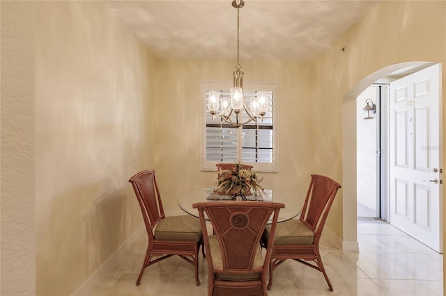 dining room with a chandelier