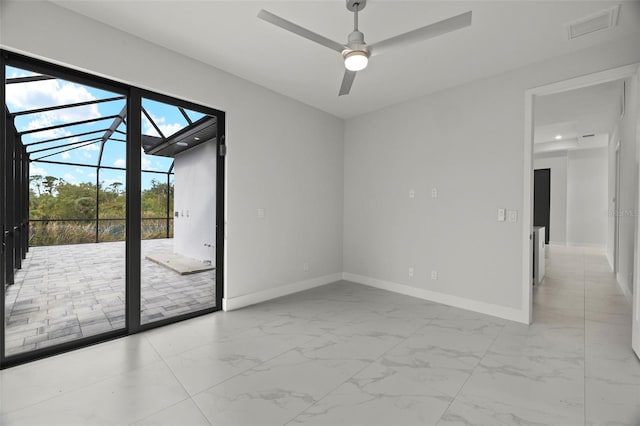 empty room featuring ceiling fan