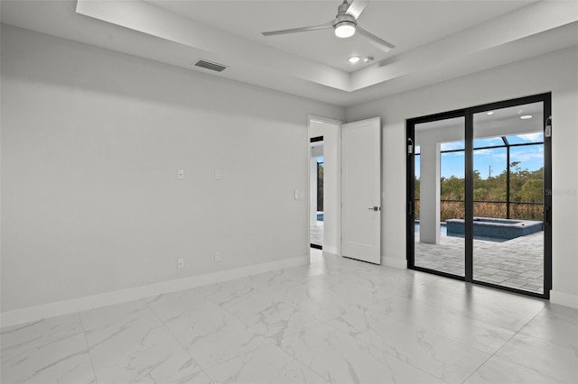 spare room featuring ceiling fan