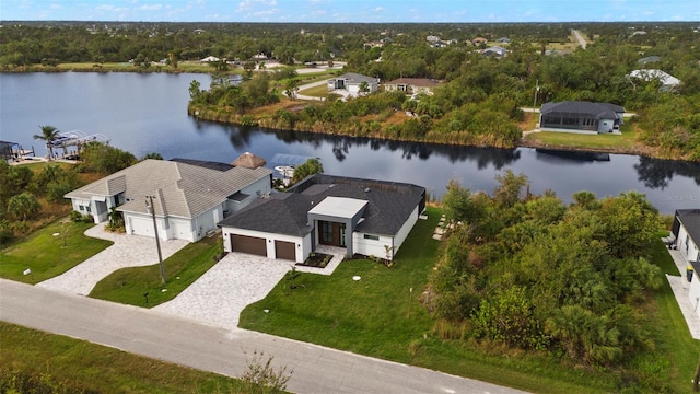 drone / aerial view with a water view