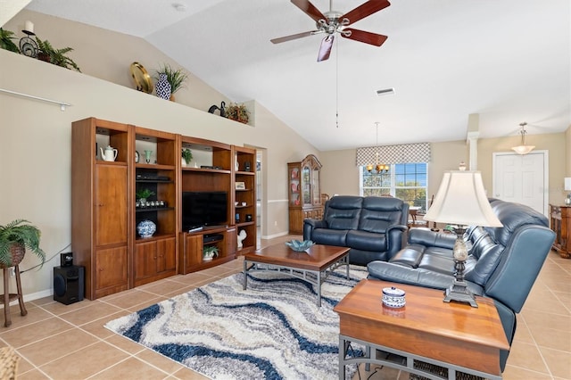 living room with light tile patterned floors, ceiling fan with notable chandelier, and vaulted ceiling