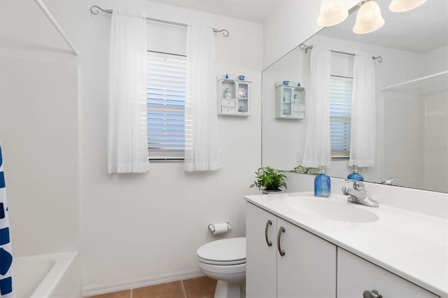 full bathroom with tile patterned floors, vanity, toilet, and shower / tub combo