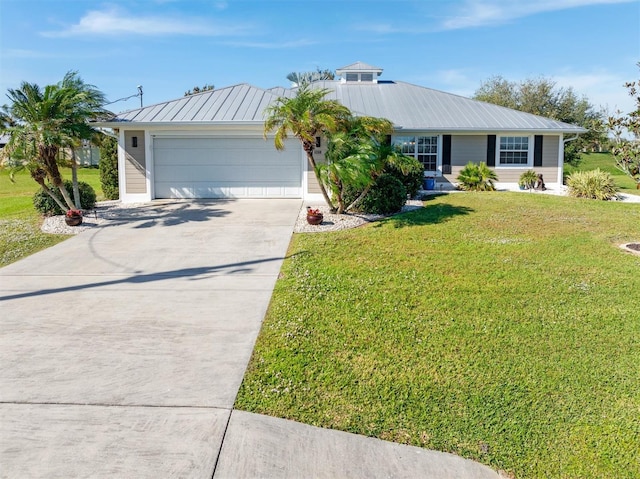 single story home with a front yard and a garage