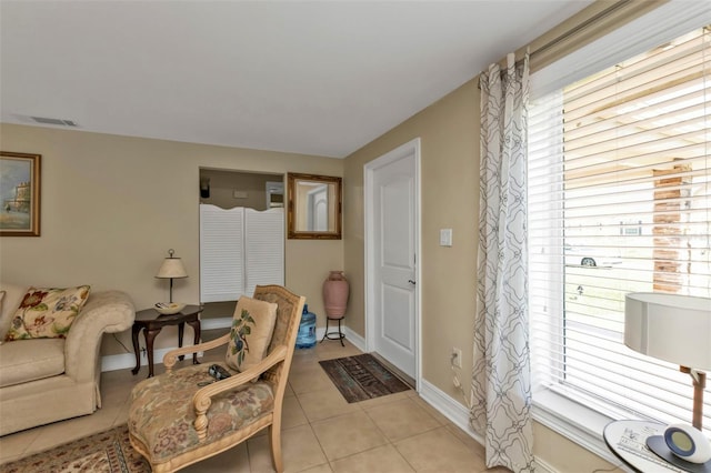 living room with light tile patterned flooring