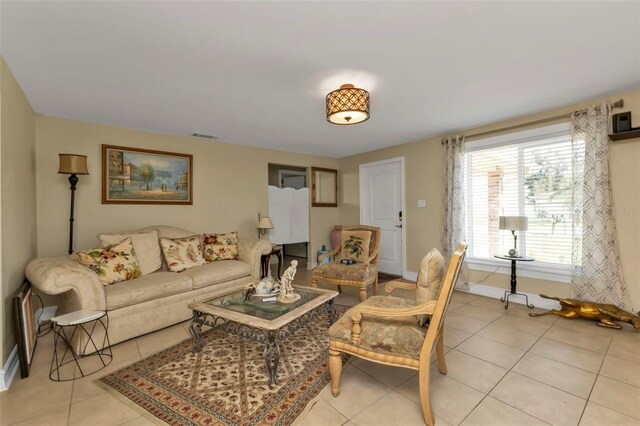 living room with light tile patterned flooring