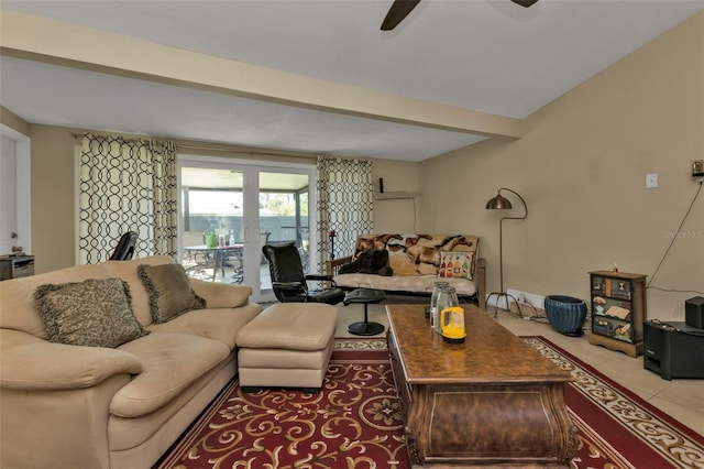 tiled living room with ceiling fan