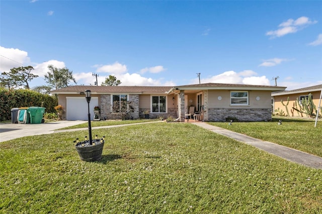 single story home featuring a garage and a front lawn