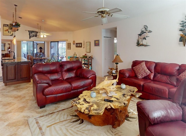 tiled living room featuring vaulted ceiling and ceiling fan