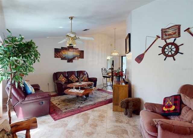 living room with ceiling fan and vaulted ceiling