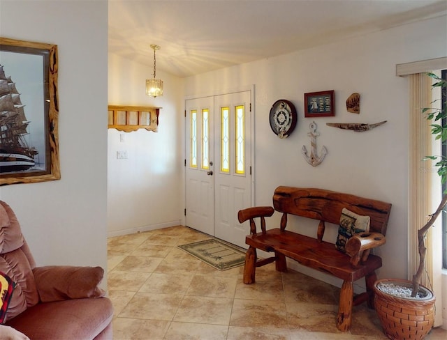 foyer with light tile patterned floors