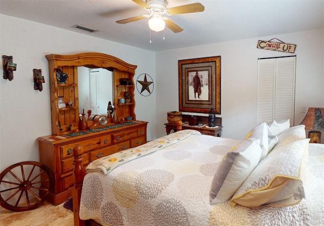 carpeted bedroom featuring ceiling fan