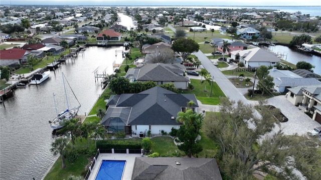 bird's eye view with a water view