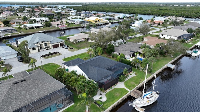 bird's eye view with a water view