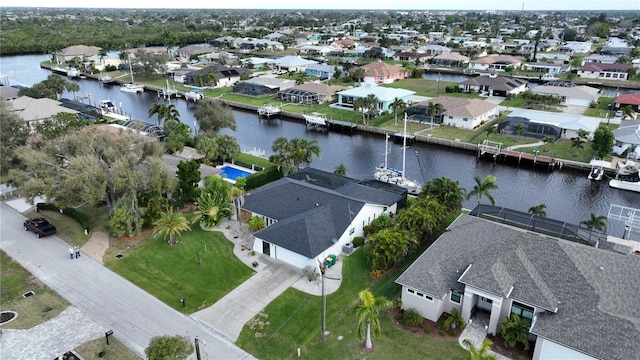 drone / aerial view with a water view