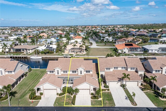 3800 Bal Harbor Blvd Unit 312, Punta Gorda, FL 33950 - aerial perspective of suburban area featuring a large body of water and property parcel outlined
