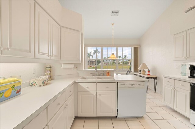 3800 Bal Harbor Blvd Unit 312, Punta Gorda, FL 33950 - kitchen featuring dishwasher, a sink, white cabinetry, and light countertops