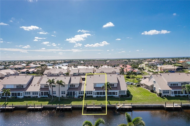 drone / aerial view featuring a water view