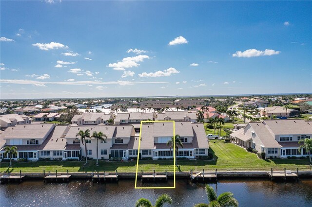 3800 Bal Harbor Blvd Unit 312, Punta Gorda, FL 33950 - aerial view of residential area featuring property boundaries highlighted and a nearby body of water