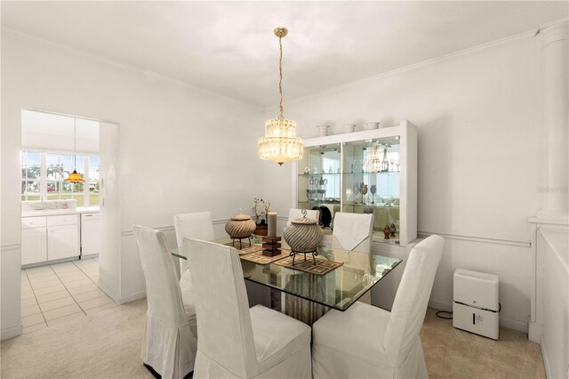 3800 Bal Harbor Blvd Unit 312, Punta Gorda, FL 33950 - dining space with a chandelier, light carpet, crown molding, and light tile patterned floors