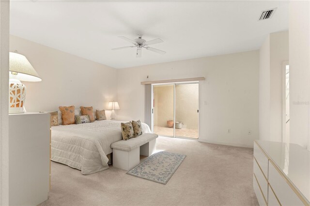 3800 Bal Harbor Blvd Unit 312, Punta Gorda, FL 33950 - bedroom with light carpet, access to outside, and ceiling fan