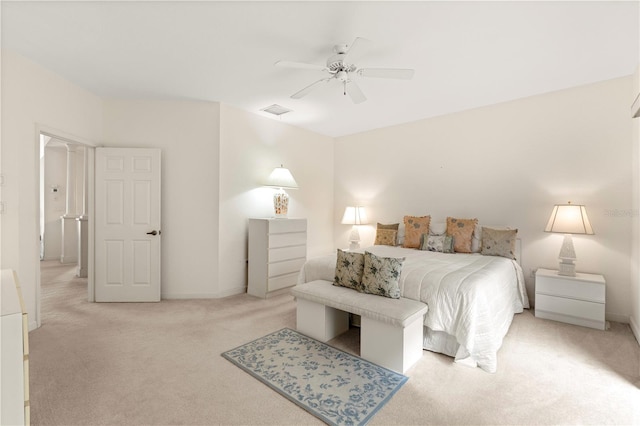 bedroom with ceiling fan and light colored carpet