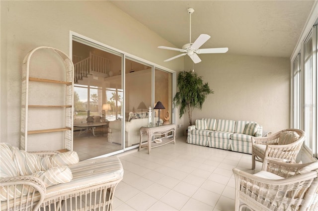 sunroom / solarium featuring vaulted ceiling and ceiling fan