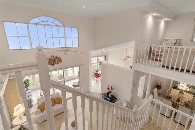3800 Bal Harbor Blvd Unit 312, Punta Gorda, FL 33950 - stairway featuring a ceiling fan, a towering ceiling, ornamental molding, healthy amount of natural light, and recessed lighting