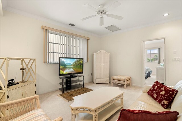 3800 Bal Harbor Blvd Unit 312, Punta Gorda, FL 33950 - living area with carpet, crown molding, a ceiling fan, and baseboards