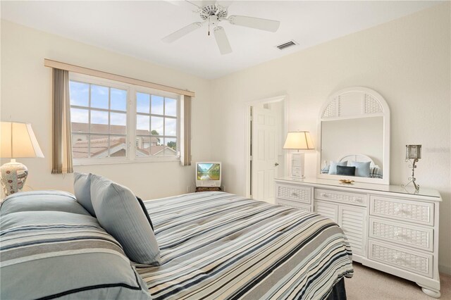 3800 Bal Harbor Blvd Unit 312, Punta Gorda, FL 33950 - bedroom with ceiling fan and light colored carpet