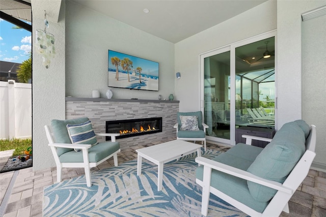 view of patio / terrace featuring an outdoor living space with a fireplace