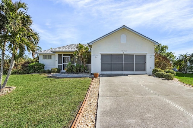 single story home with a garage and a front lawn