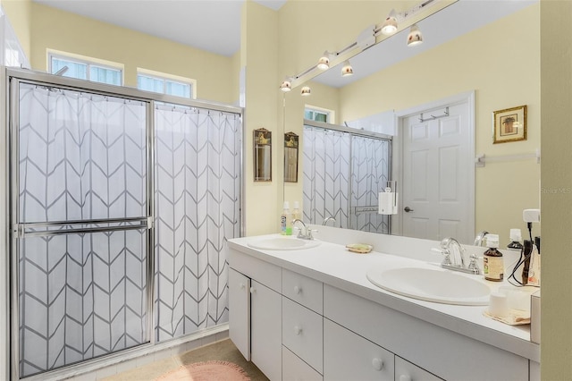 bathroom featuring vanity and walk in shower